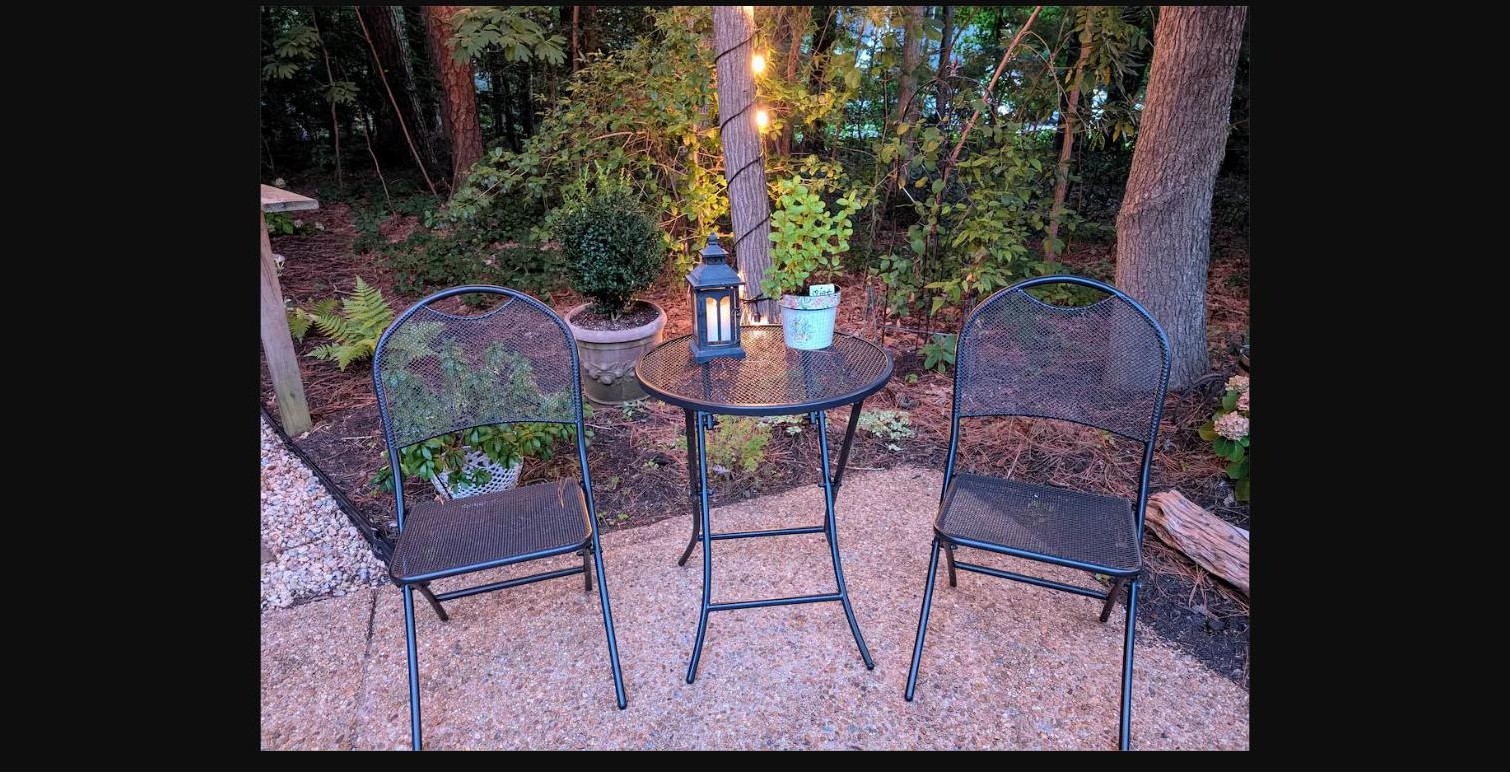Close view of the garden bistro table with a lantern